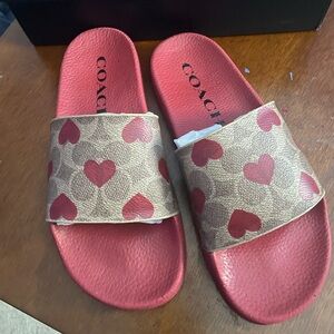 NWT coach slides with Valentines Day Print. Size 7